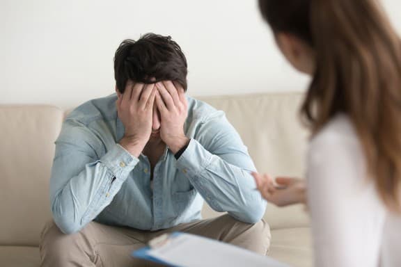 A patient receiving trauma counseling and therapy at Total Life Counseling