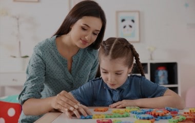 Orlando ASD Counselor working with Students with play therapy