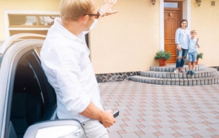 Father brings son home to his mother, son waves good-bye to him