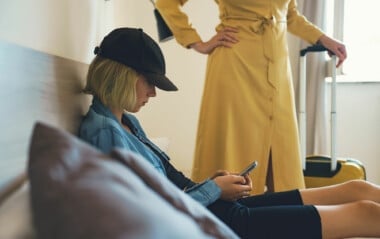teen-addictions-orlando - Total Life Counseling for Children, Teens, Adolescents and Adults in Orlando Winter Park Clermont Lake Mary and Central Florida Rebellious teen wearing black had and blue jacket looks downward at her getting counseling at Total Life Counseling Center