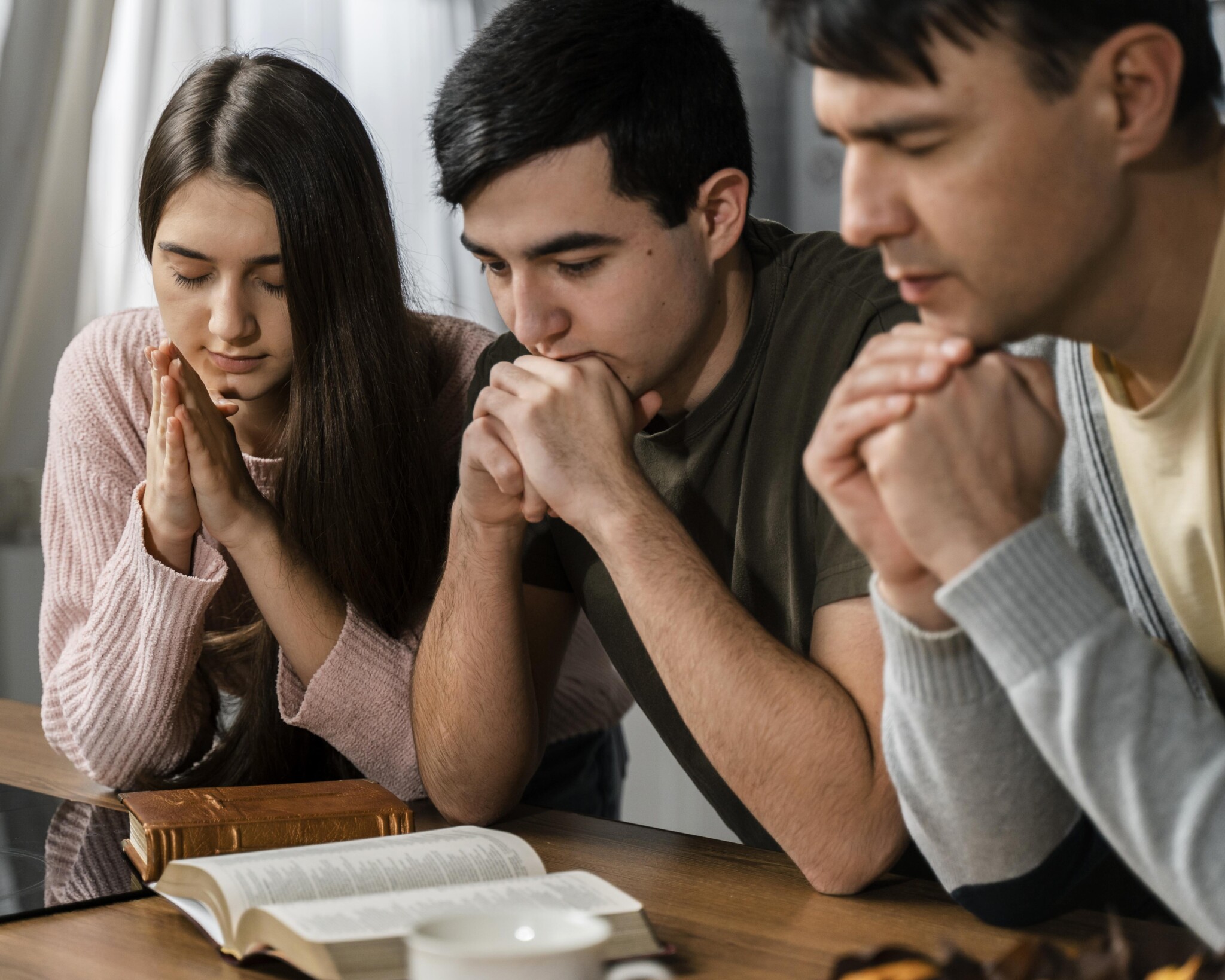 Christian Counseling Orlando friends praying and getting help by a Total Life Counseling Therapist