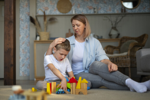 Lake Mary Play therapist helping a angry boy with Autism at Total Life Counseling Center