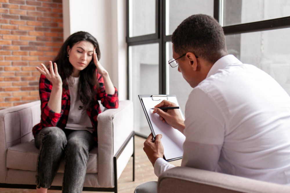 Winter Garden Male Counselor helping a woman with Depression Counseling at Total Life Counseling Center Orlando counselor helping a woman with depression at Total Life Counseling