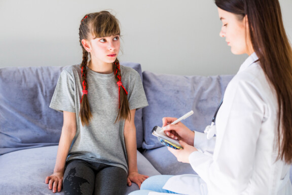 Winter Park Play therapist helping a teen girl with Total Life Counseling Center