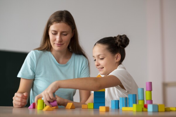 Orlando Play therapist Psychologist playing with her client