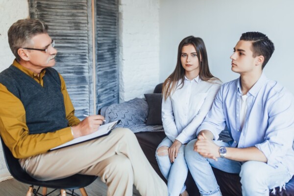 Couple talking with a counselor Couple talking with a counselor