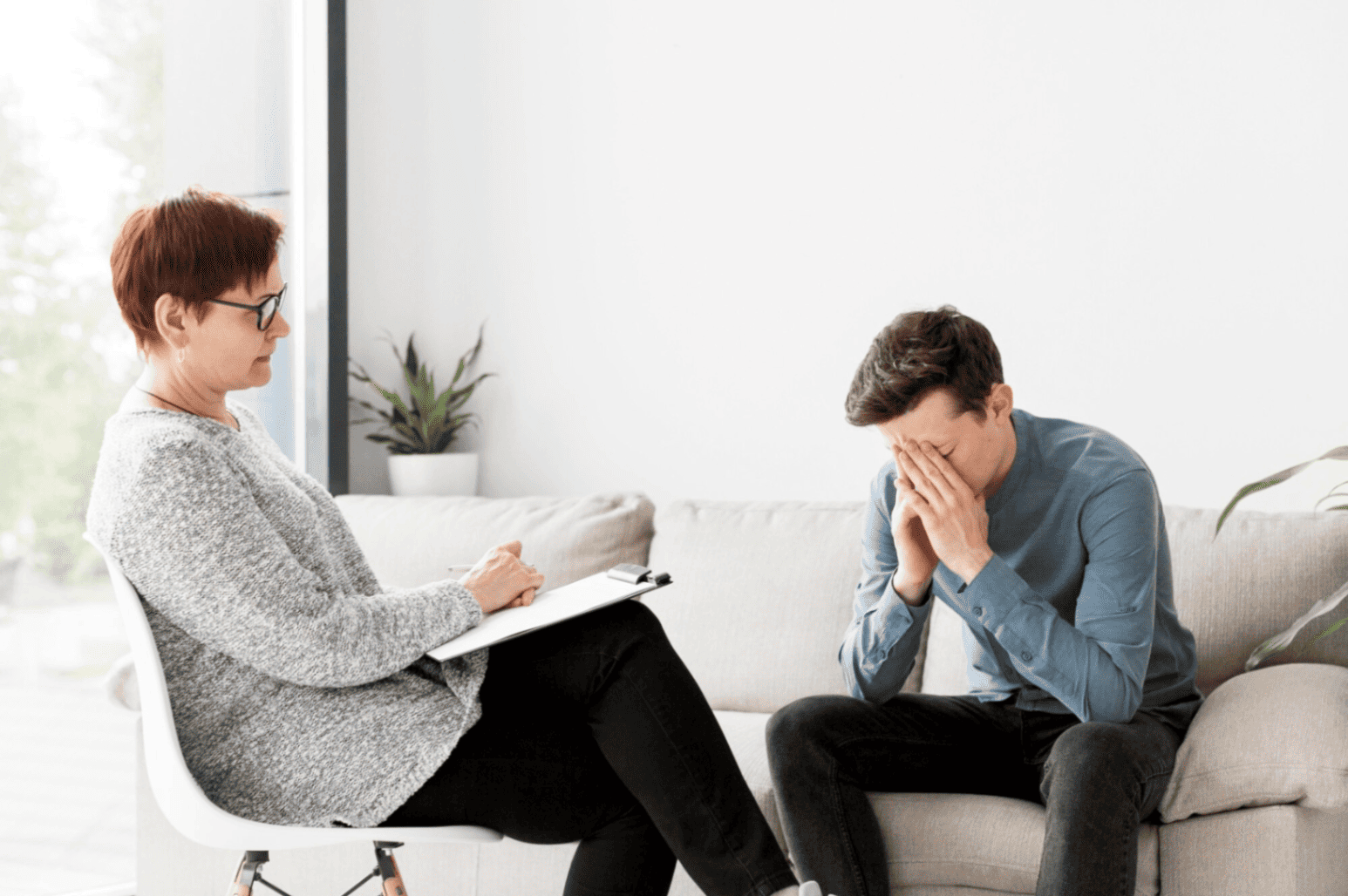 A man expressing his feelings during a therapy session A man expressing his feelings during a therapy session