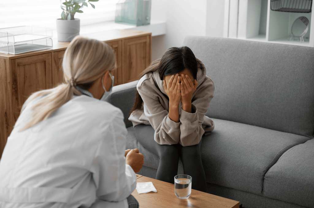 image – 2025-07-08T115338341 1 An emotionally distressed new mom attending a PPD counseling session