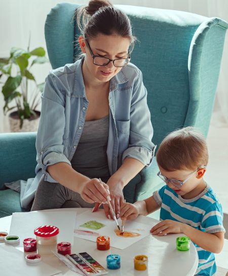 Child with therapist undergoing play therapy Child with therapist undergoing play therapy