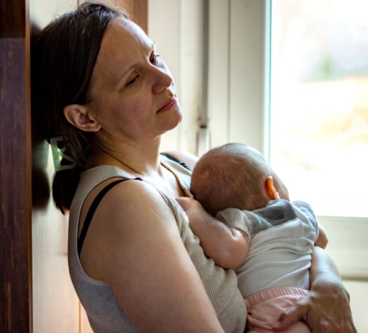 A new mother attending a showing sense of depression