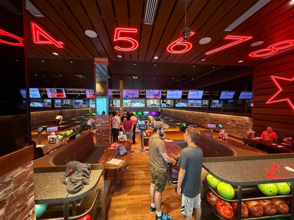 Adults interacting in a social setting Adults interacting in a social setting