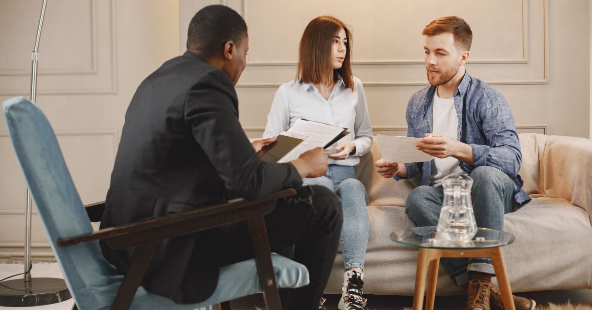 Couple talking to a counselor