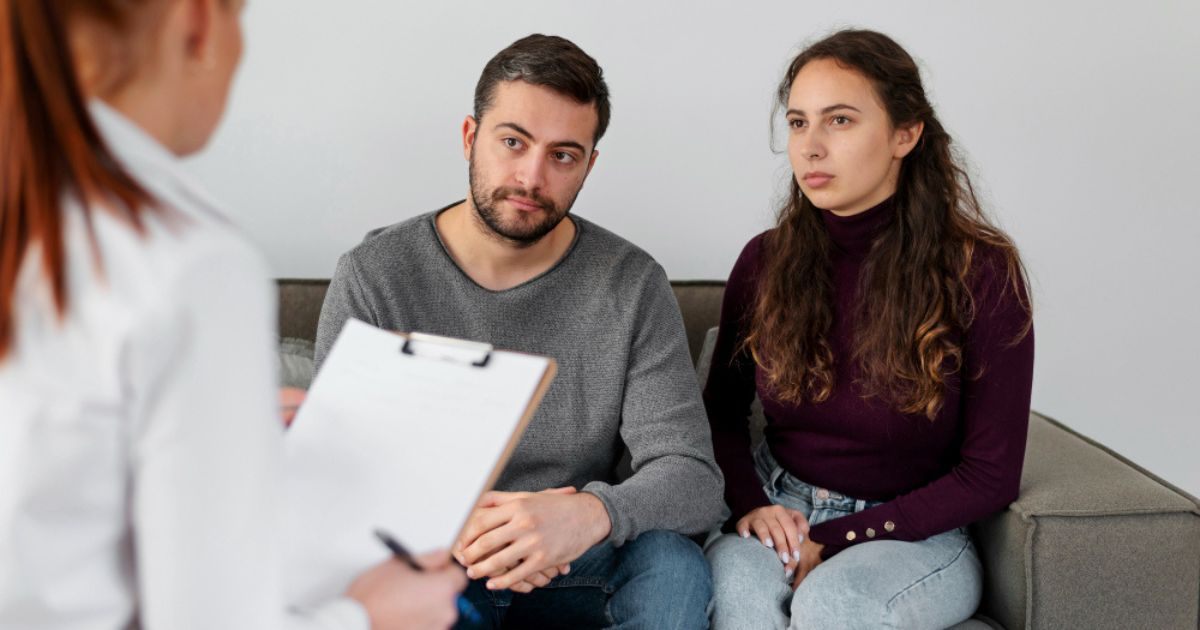 Close up couple discussing with therapist Close up couple discussing with therapist