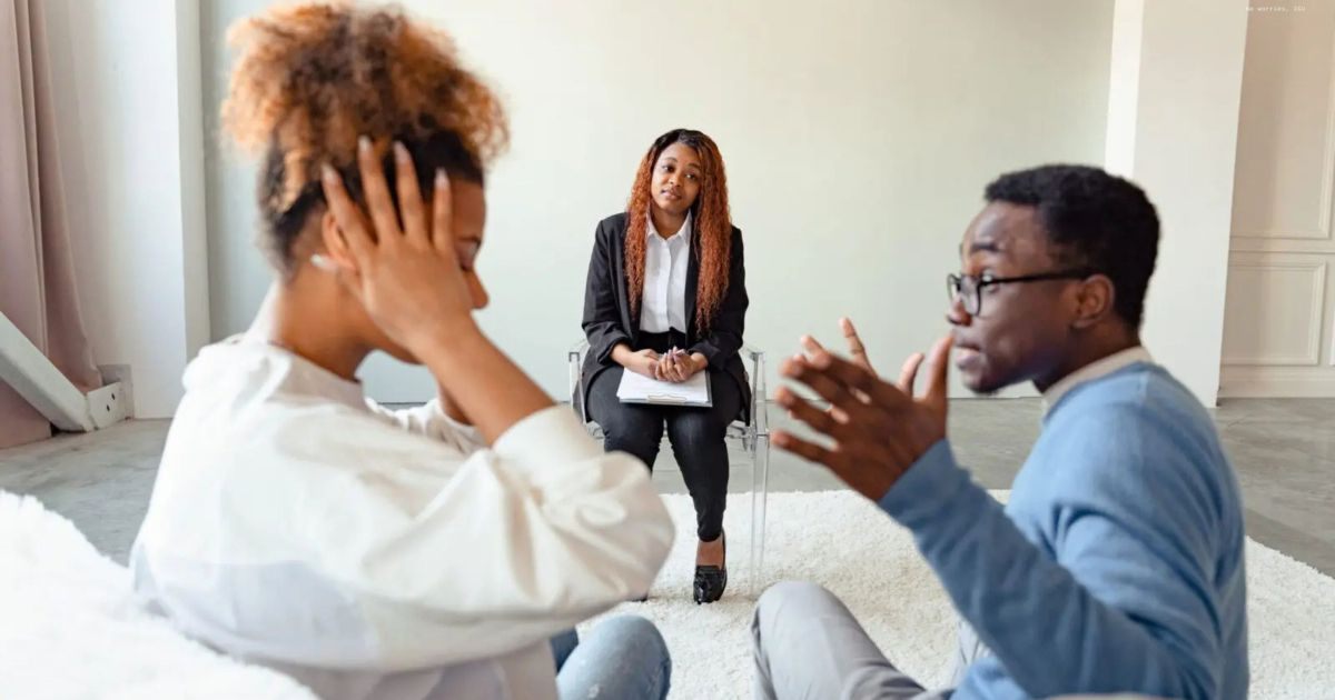Couple arguing in front of a therapist Couple arguing in front of a therapist