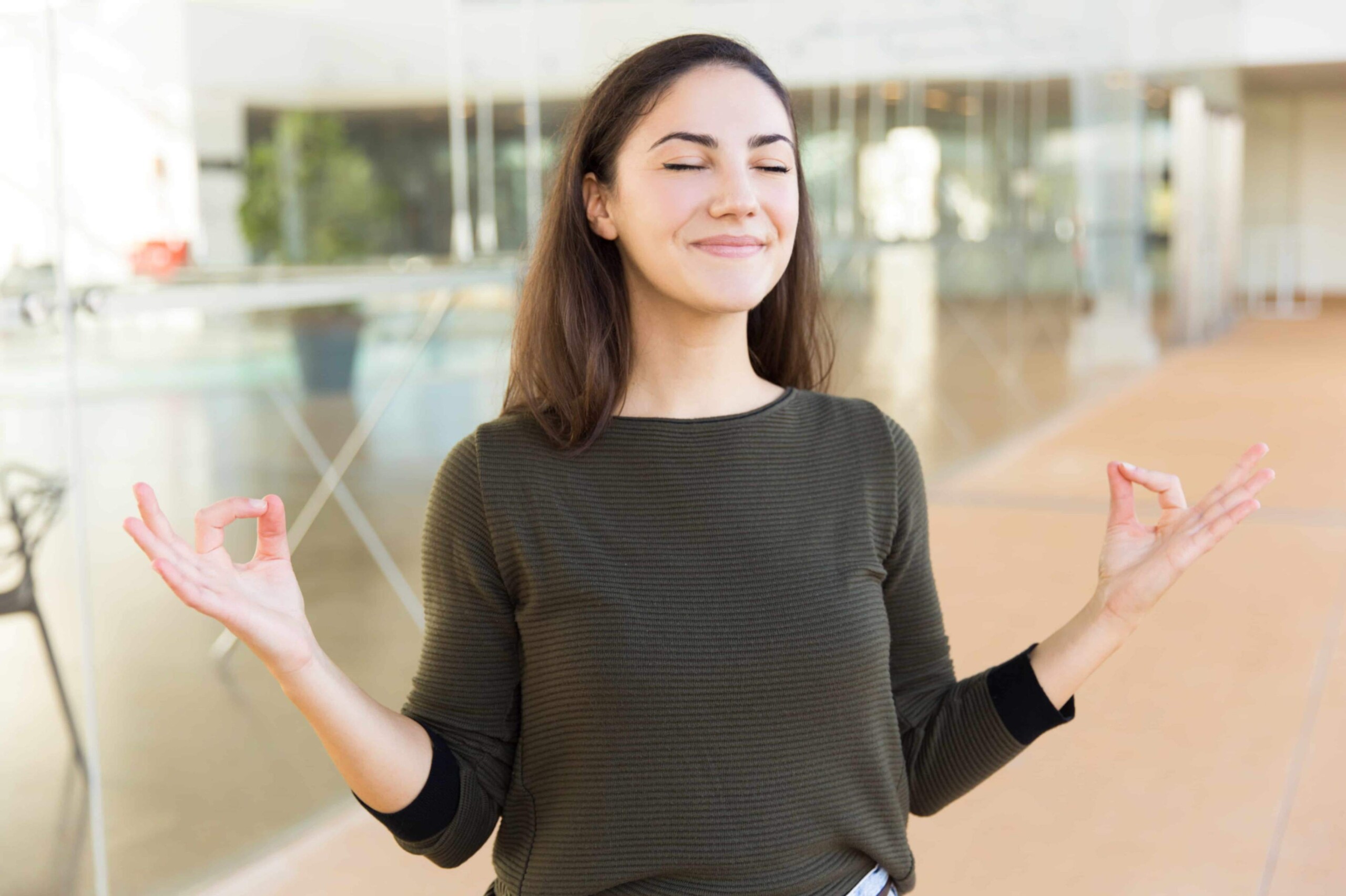 Woman standing and meditating