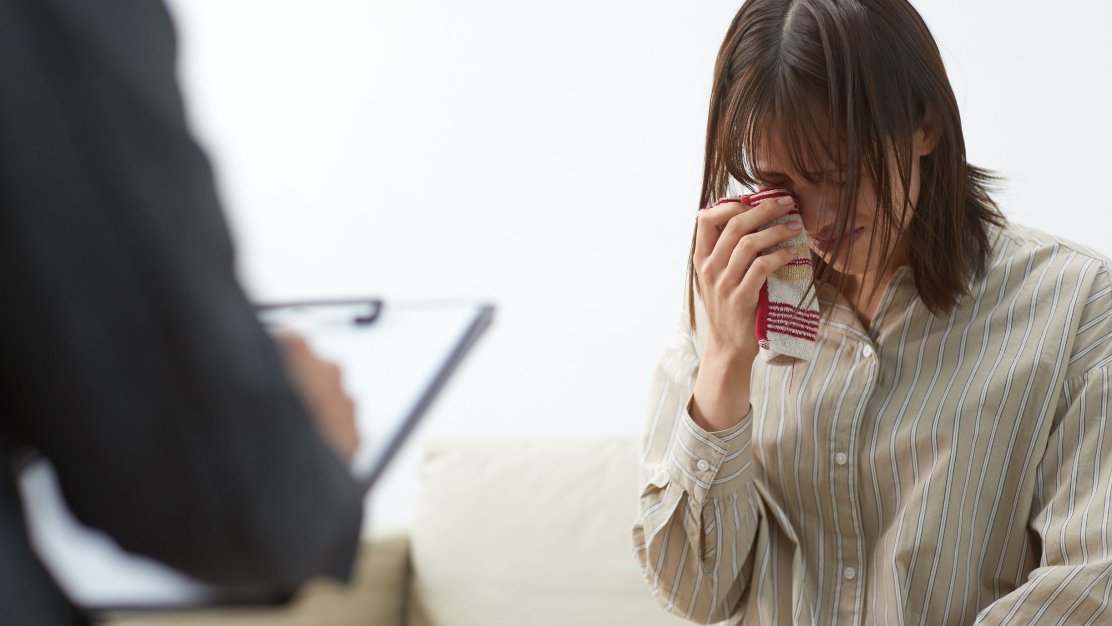 Patient crying infront of a counselor