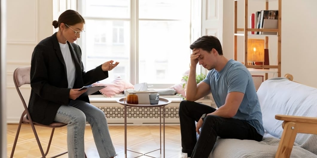 Depressed man having a counseling session - Total Life Counseling for Children, Teens, Adolescents and Adults in Orlando Winter Park Clermont Lake Mary and Central Florida Depressed man having a counseling session