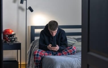 Teenager using smart phone - Total Life Counseling for Children, Teens, Adolescents and Adults in Orlando Winter Park Clermont Lake Mary and Central Florida Teenager using smart phone